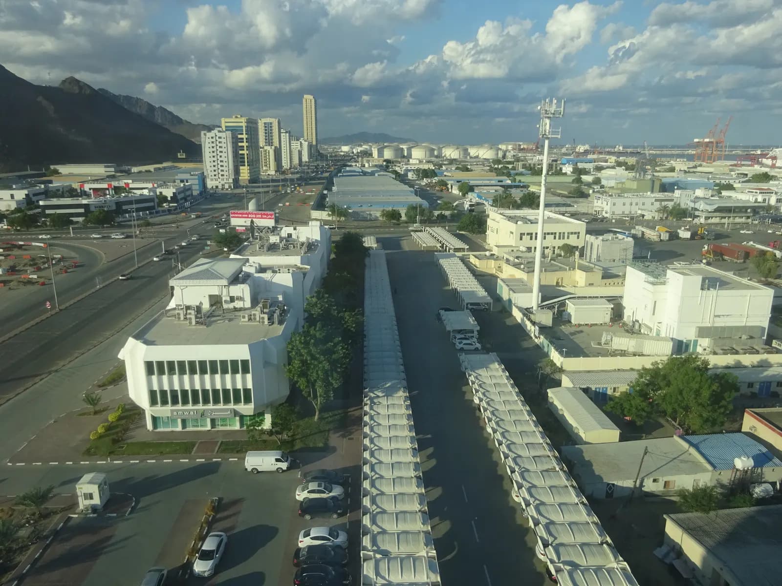 View north across Fujairah city towards Fujairah Port and the Hajar mountains