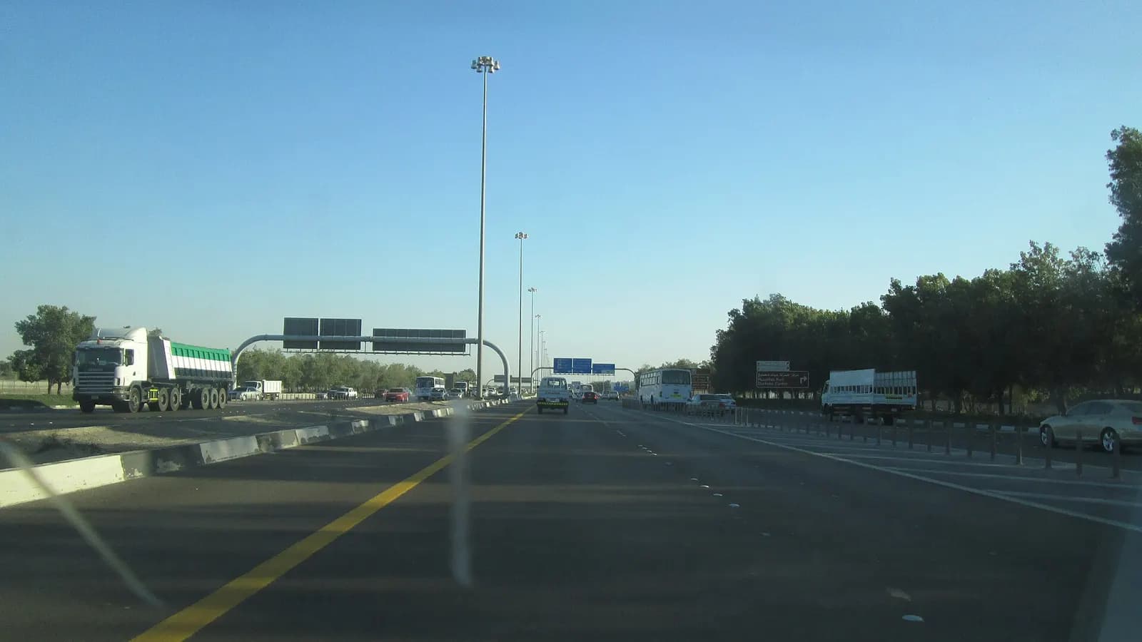 Trucks and traffic on the main road into the Musaffah industrial area of Abu Dhabi