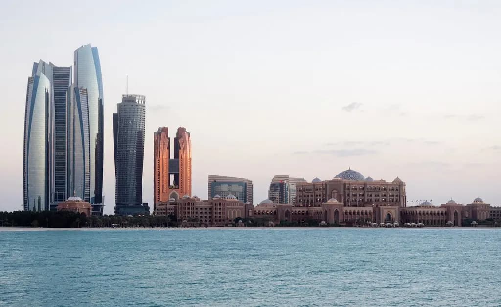 Abu Dhabi skyline with the Etihad Towers seen across the water