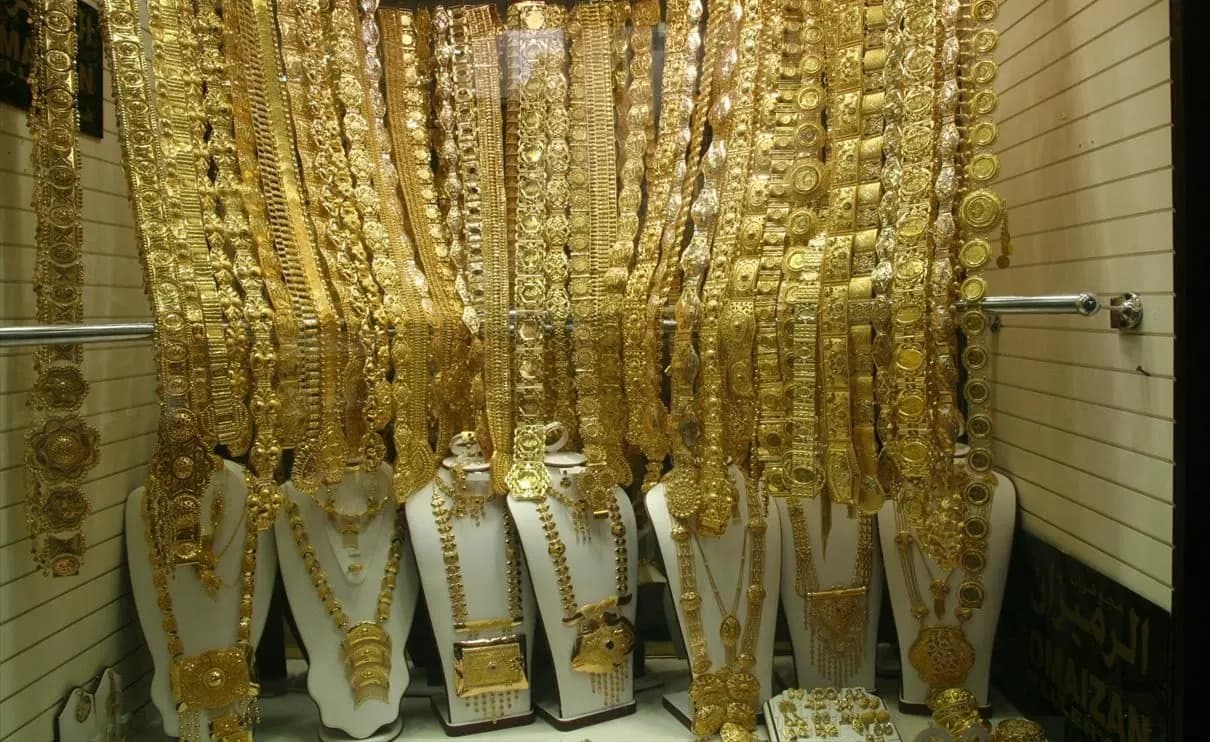 Gold necklaces and chains displayed in a shop window in Dubai's Gold Souk