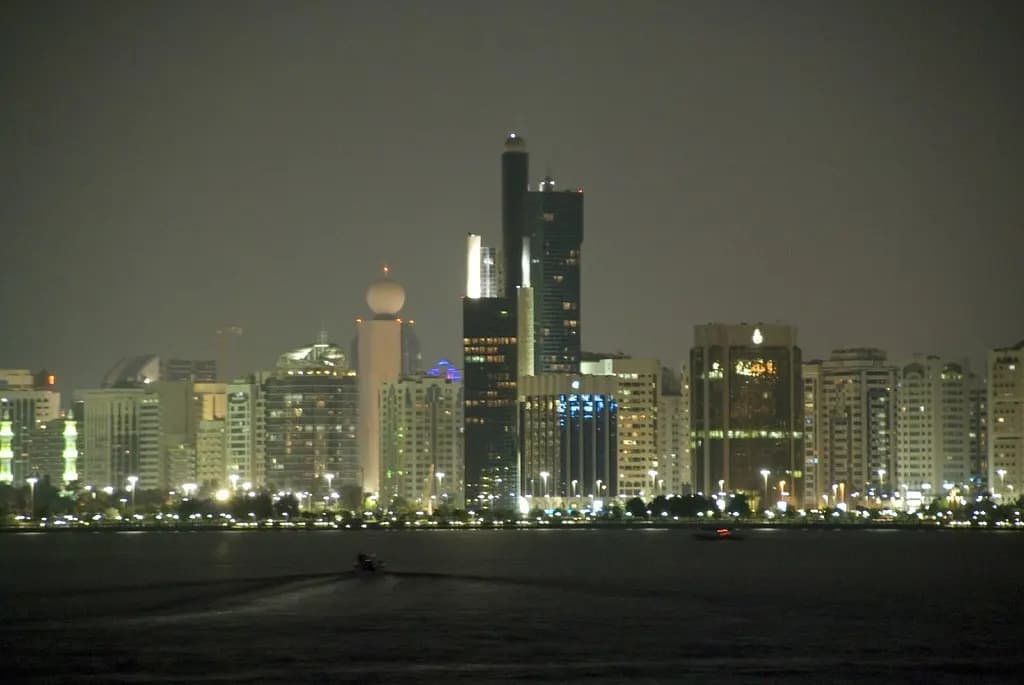 Abu Dhabi Corniche and city towers seen from across the bay in daylight