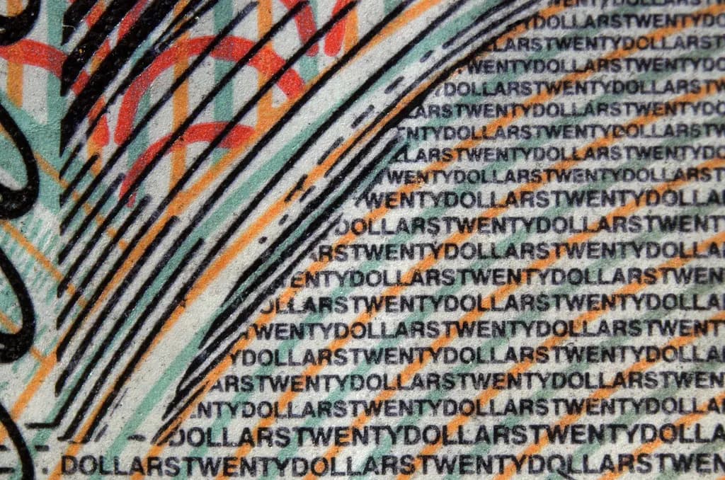 Close-up of the microprinted text on an Australian twenty-dollar polymer note