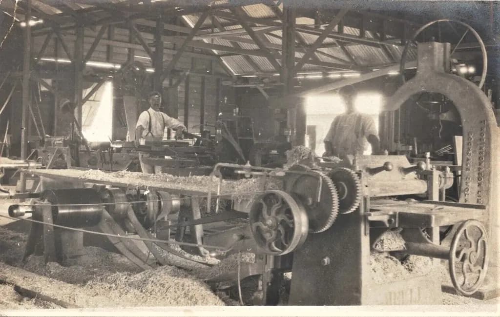 Workers and machinery inside a timber joinery workshop in Esk, Queensland, in 1916
