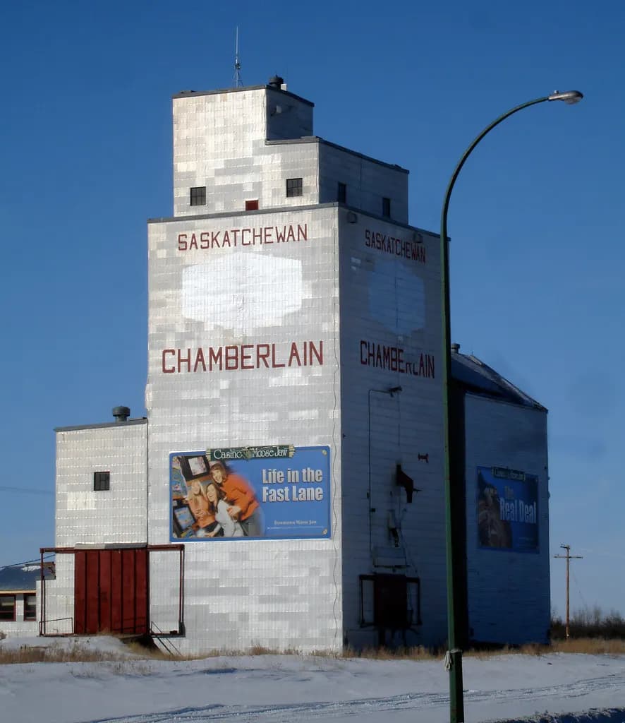 A wooden grain elevator beside the highway at Chamberlain, Saskatchewan