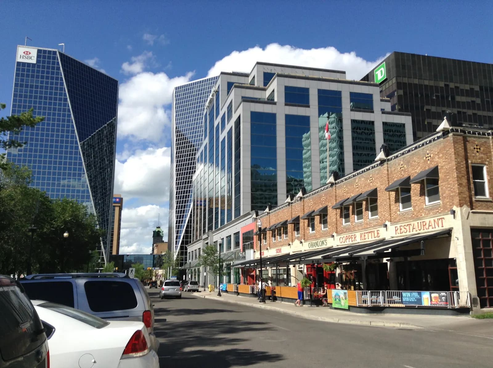 Downtown Regina, Saskatchewan, with office towers and street-level businesses