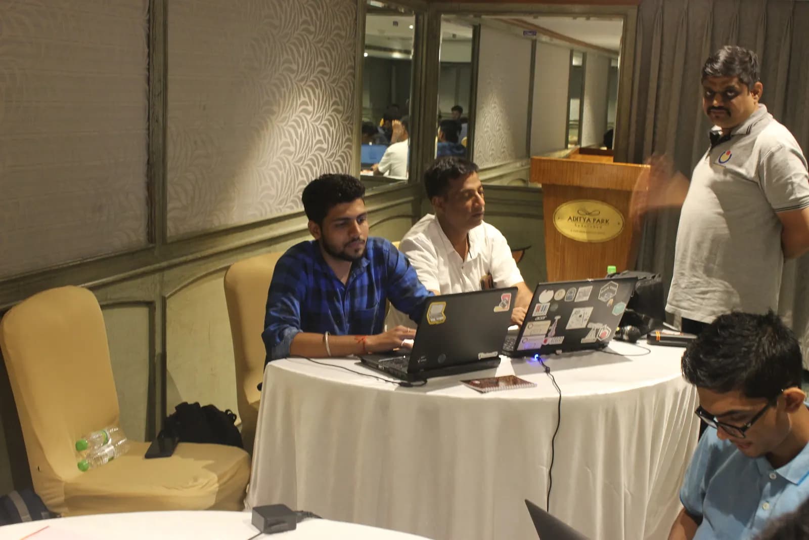 Young founders working on laptops at a technology hackathon in Hyderabad
