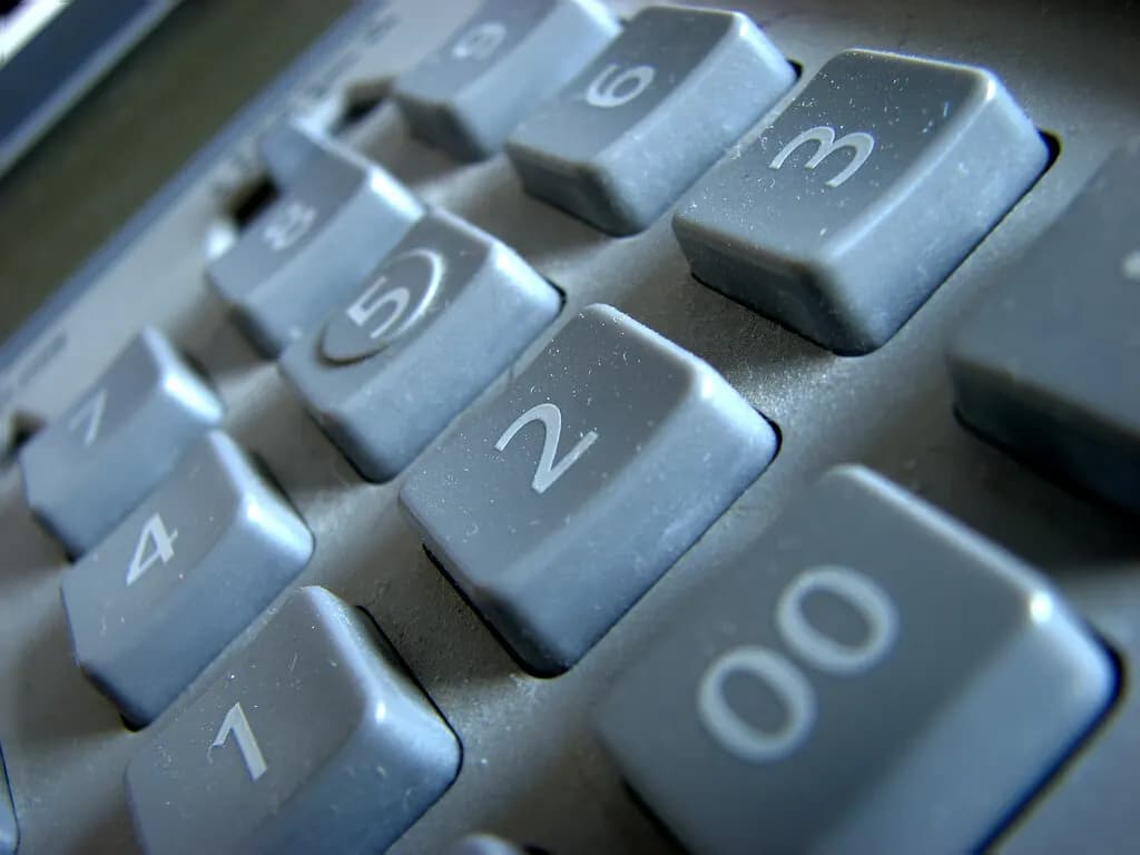 Close-up of the grey number keys of a desktop calculator
