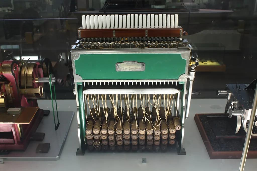 A manual multi-mould candle making machine with wicks threaded through rows of tube moulds