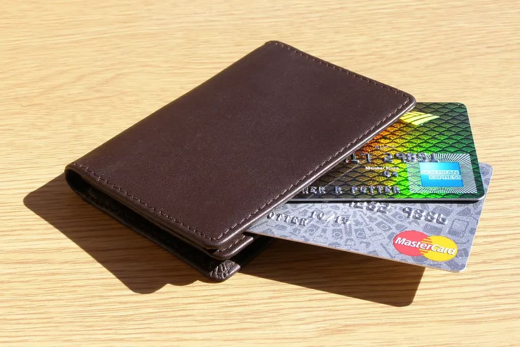 Several credit cards tucked into a leather wallet