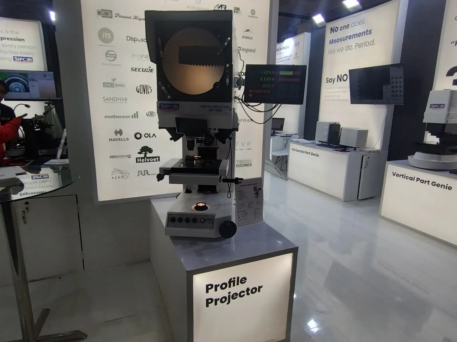 An optical profile projector used for inspecting machined parts, shown at IMTEX 2025 in Bengaluru
