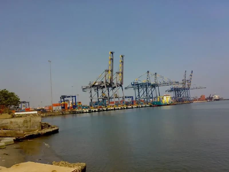 Ship-to-shore gantry cranes and stacked containers at the Chennai container terminal seen across the harbour