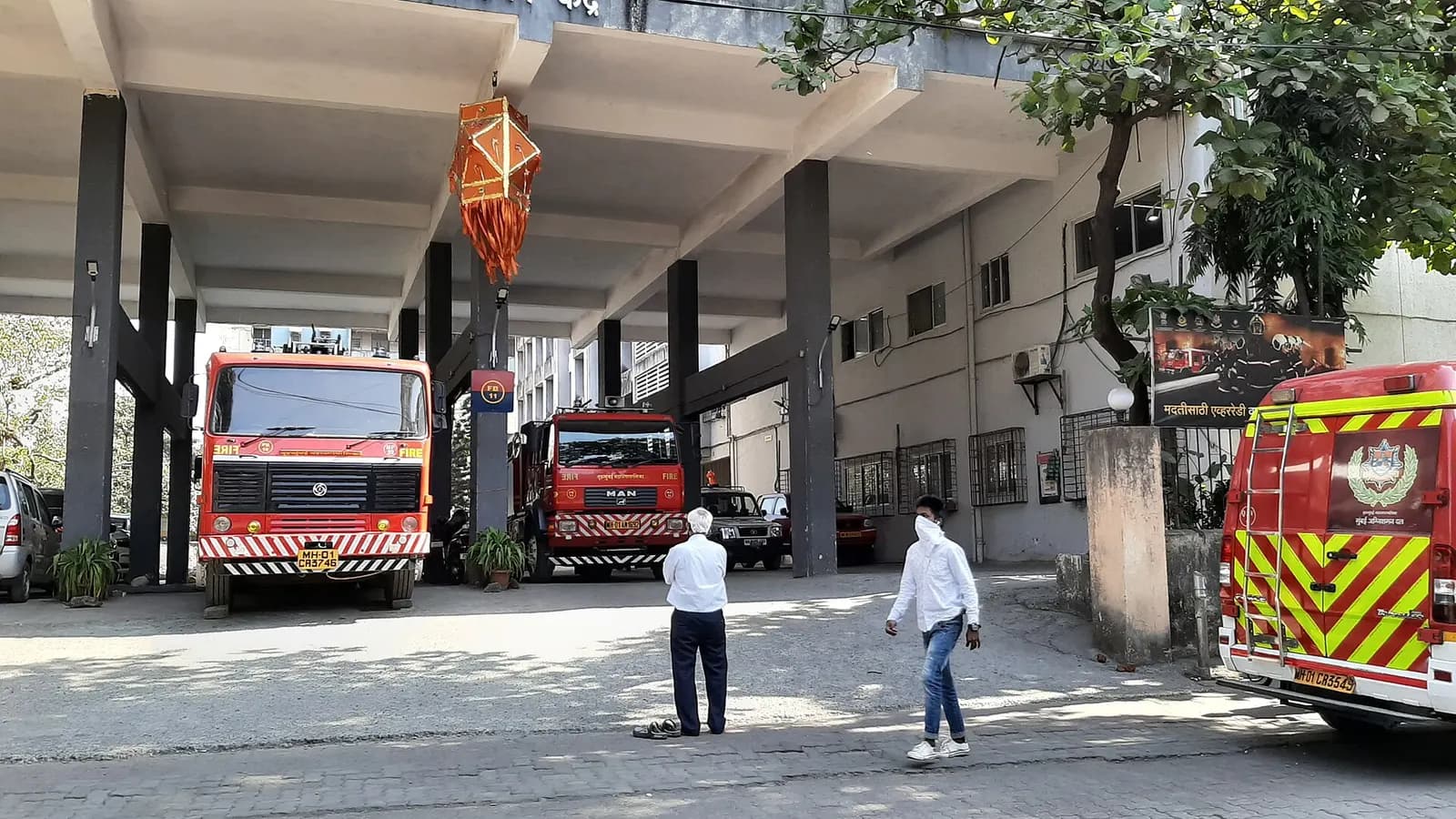 Fire engines parked in the bays of the Dadar fire station building in Mumbai