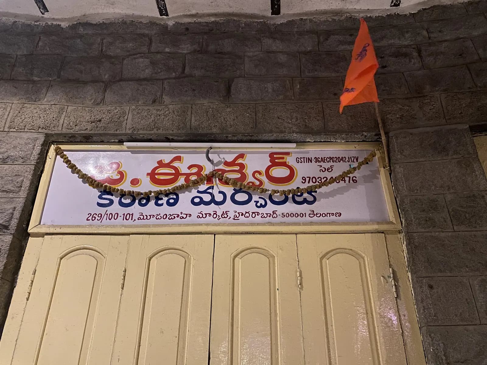 Signboard of a kirana merchant in Hyderabad's Moazzam Jahi Market showing the shop's GSTIN