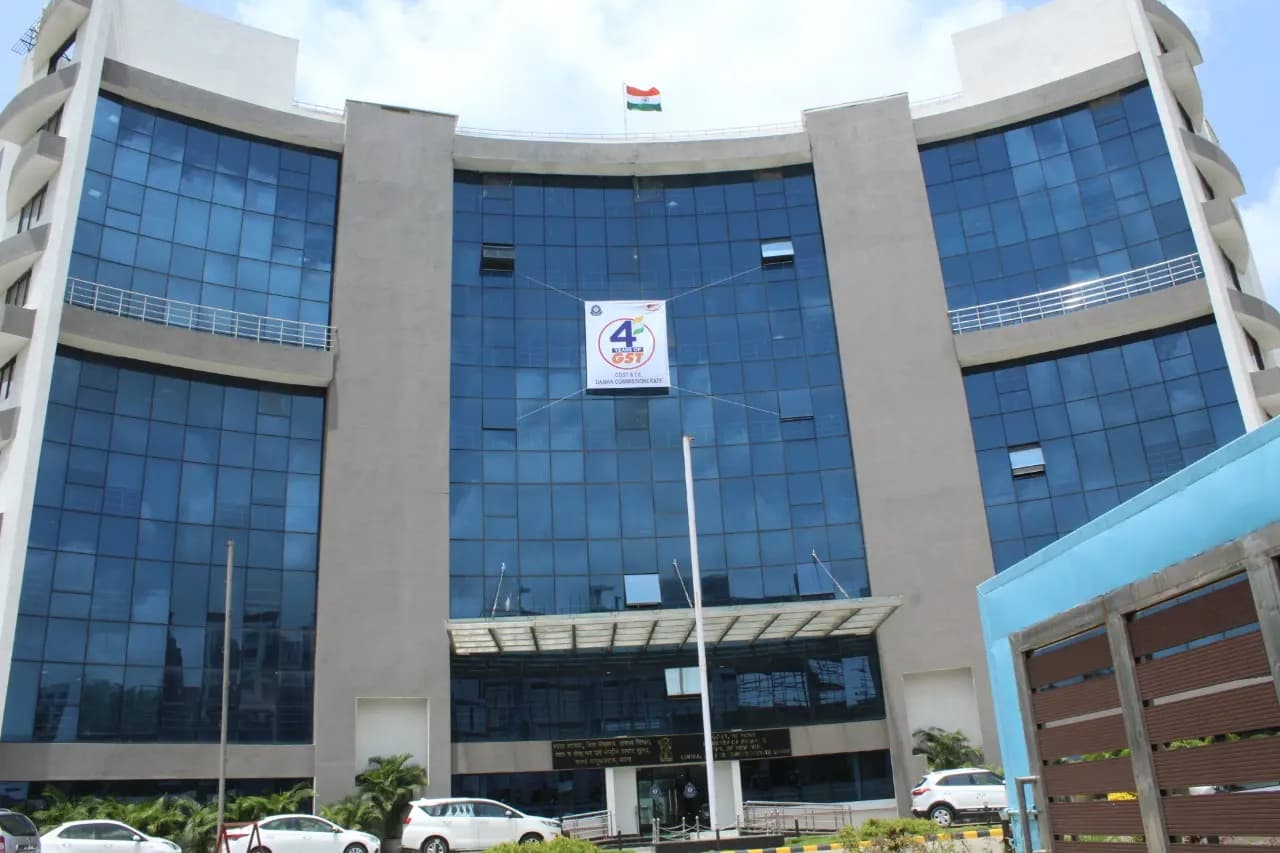 Glass-fronted GST Bhavan office building in Vapi, Gujarat