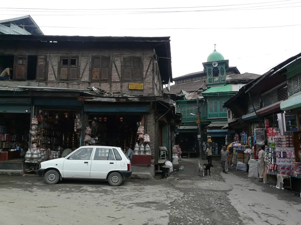 Shops under old timber-framed buildings in the Zaina Kadal area of downtown Srinagar