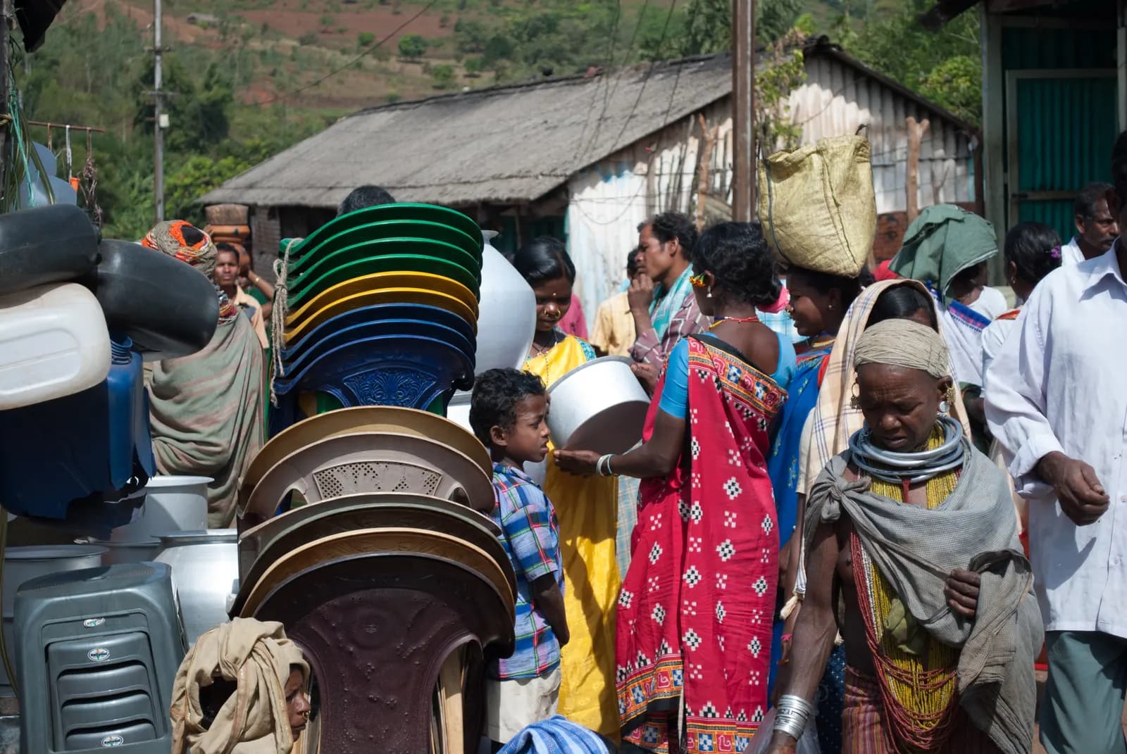 Small shops and stalls along a street market in Odisha