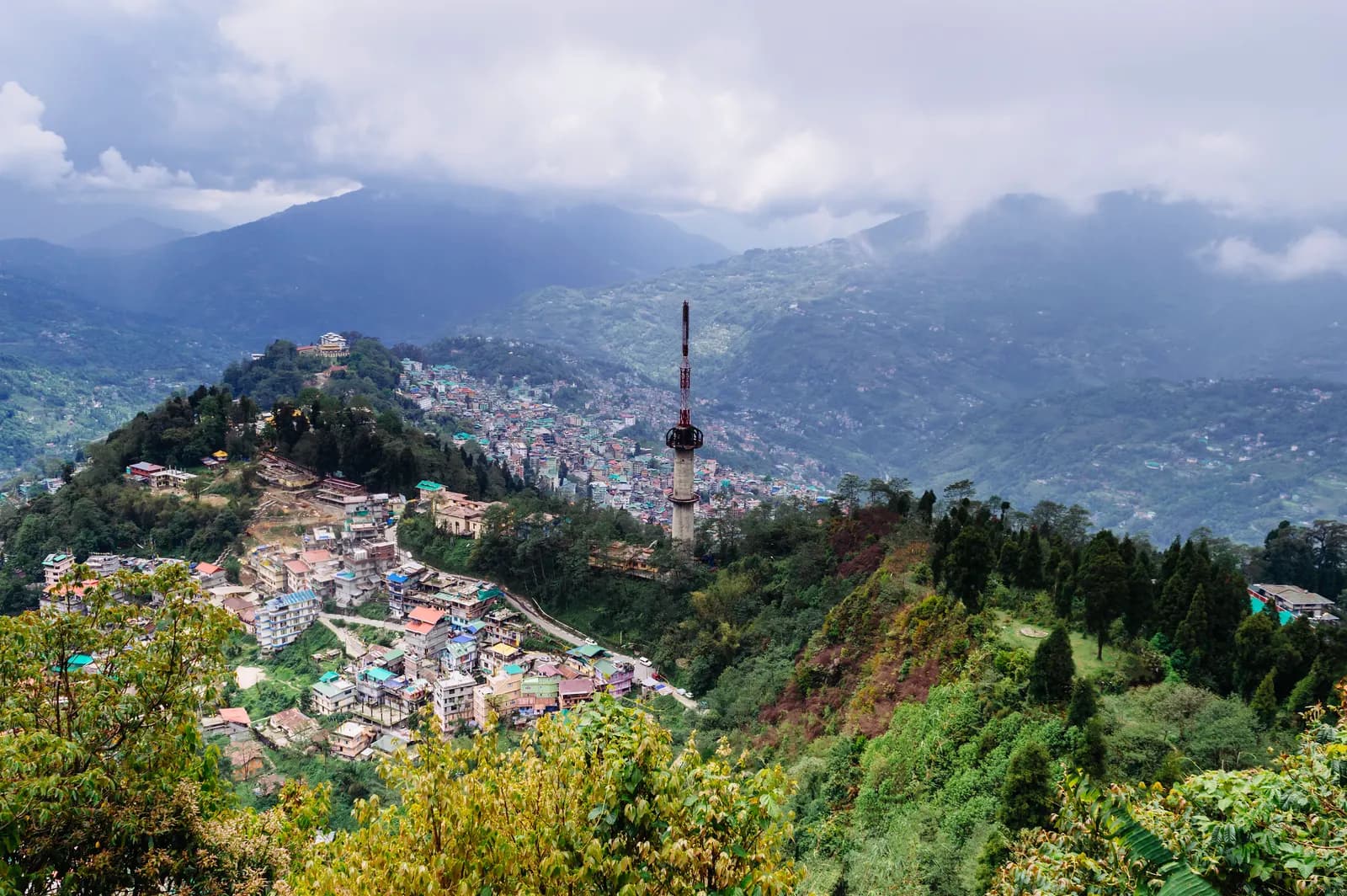 Bird's-eye view of Gangtok's buildings on the hillside, seen from Ganesh Tok
