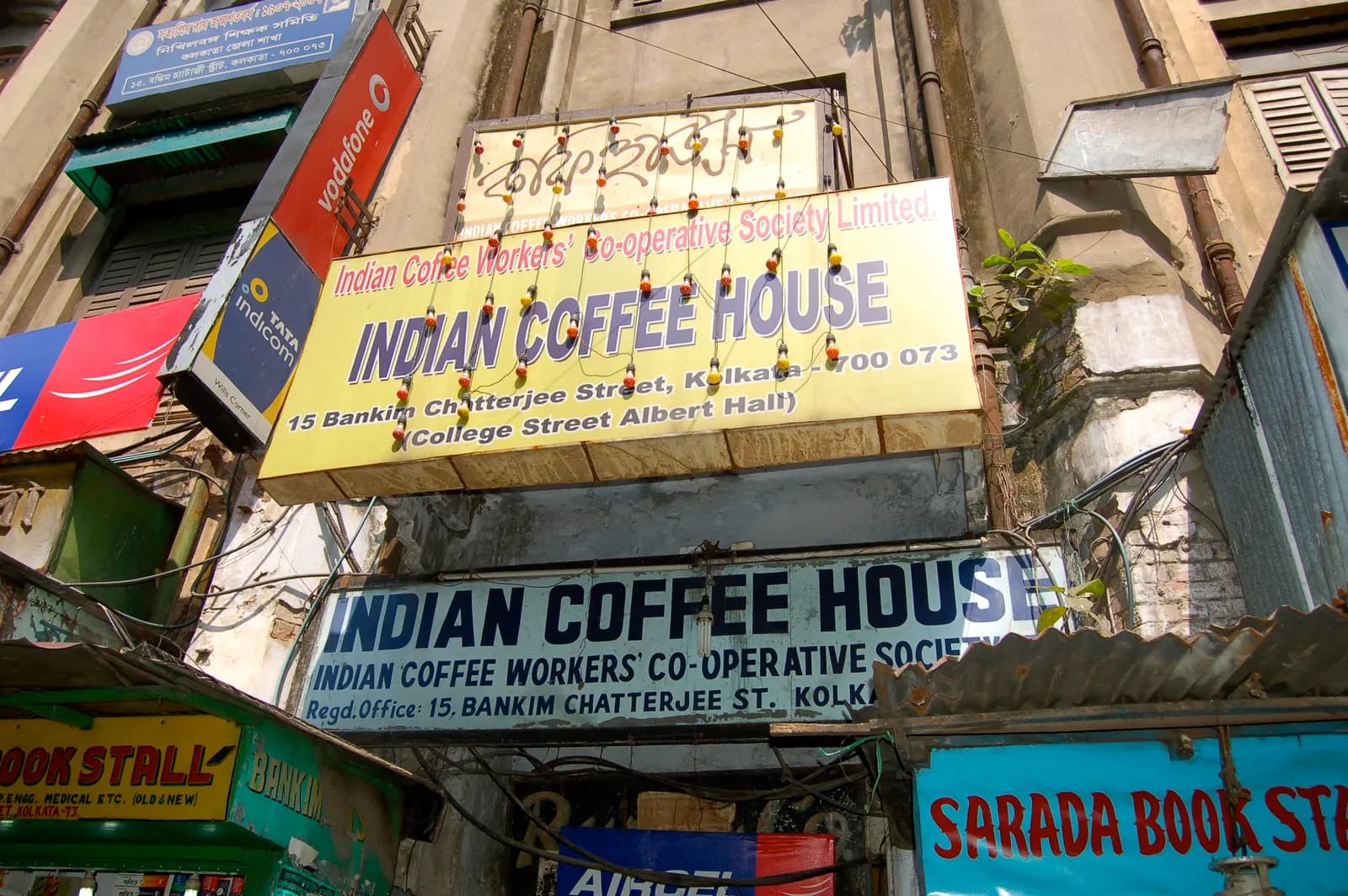 Waiters and diners inside the Indian Coffee House on College Street, Kolkata