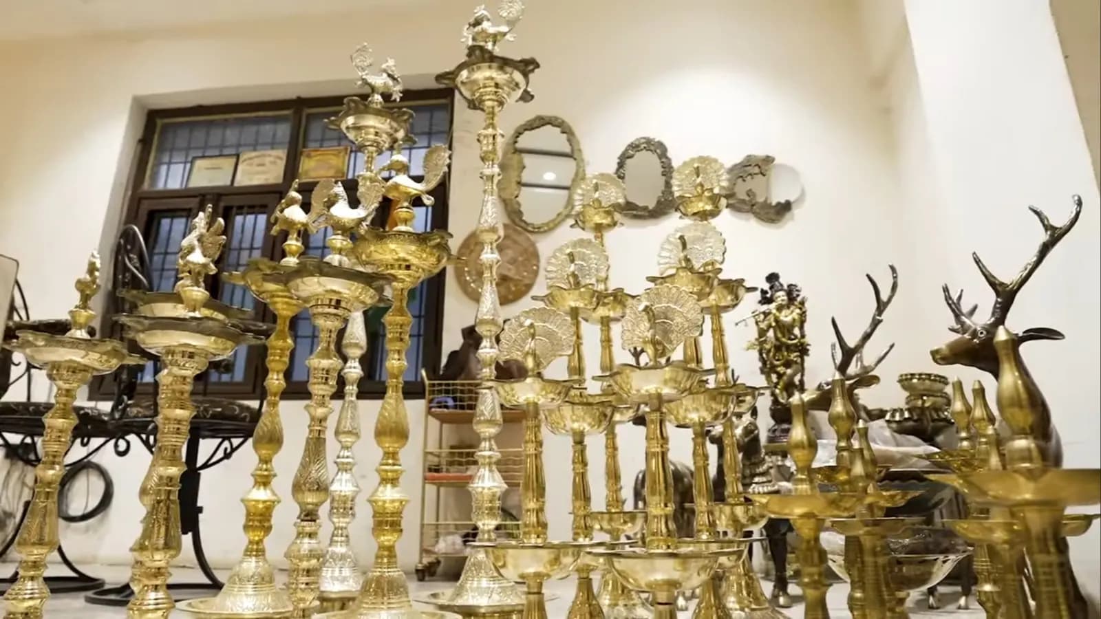 Rows of polished brass handicraft items, vases and decorative pieces made in Moradabad, Uttar Pradesh