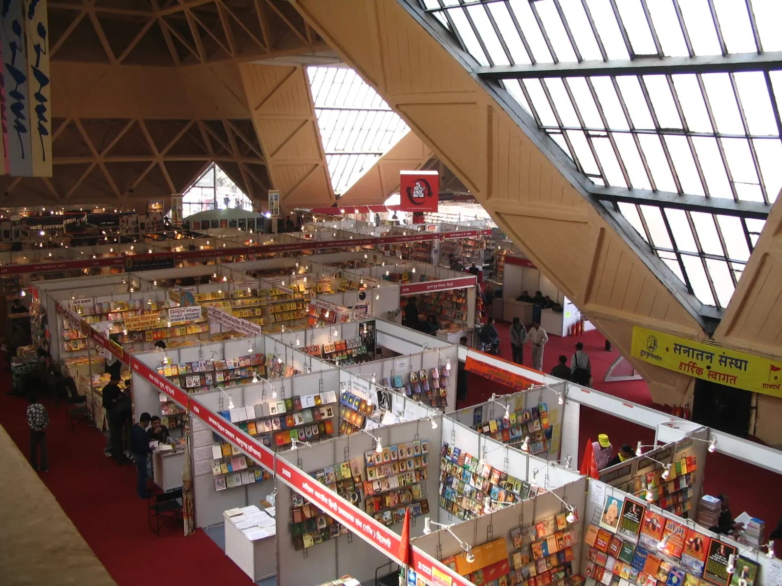 Exhibition stalls laid out under the glass roof of the linked halls 2 to 5 at Pragati Maidan, New Delhi