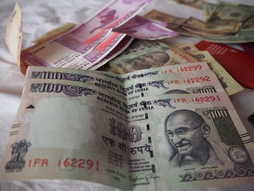 A spread of Indian rupee banknotes of different denominations