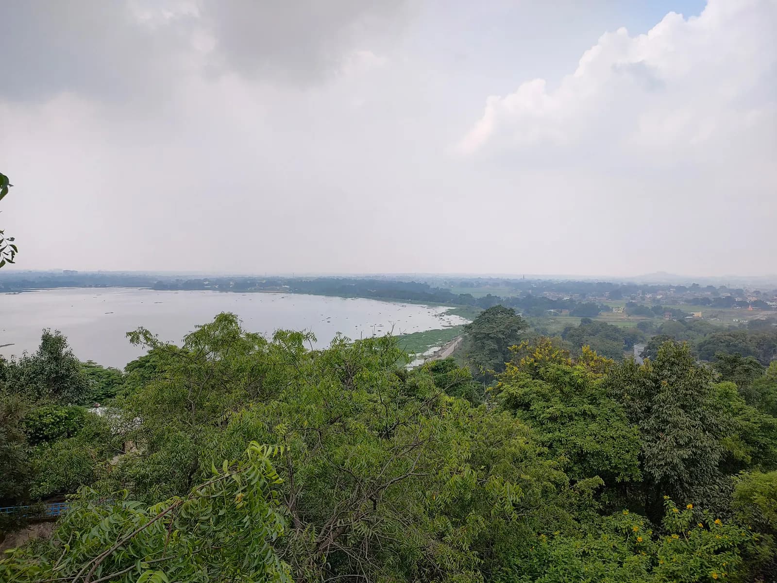 View over Ranchi and Kanke Dam from the Rock Garden, with trees in the foreground