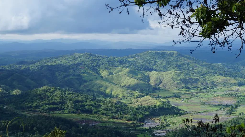 Forested hills and valley farmland on the road to Jowai in the Jaintia Hills, Meghalaya