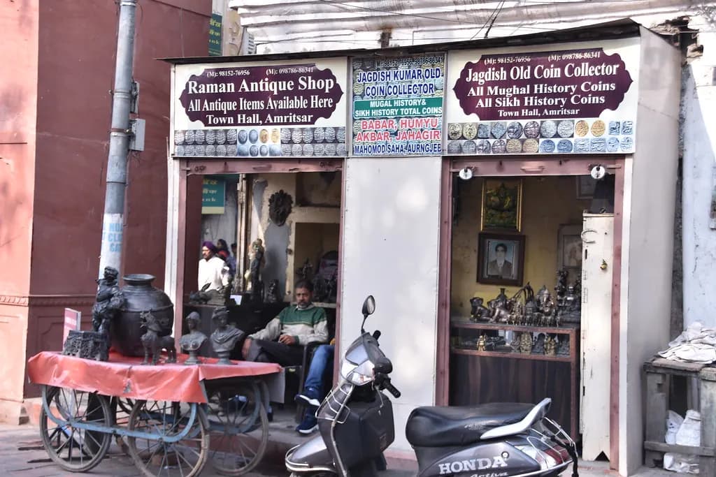 Two small antique and old-coin shops side by side near Hall Bazaar, Amritsar