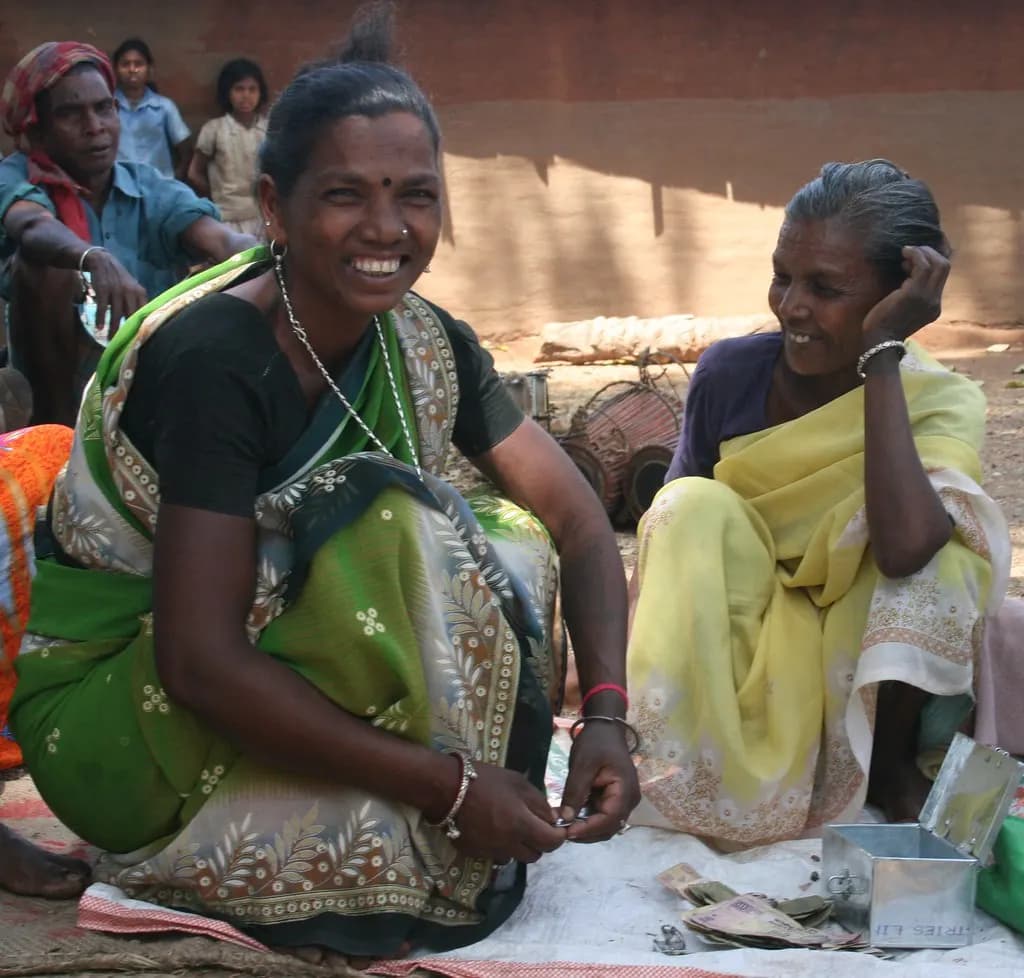 Two village women, the treasurer and president of a self-help group in India