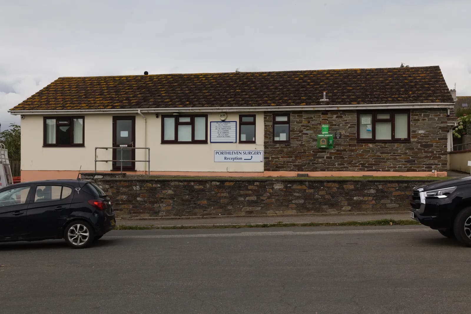 Single-storey GP surgery building with a car park in Porthleven, Cornwall