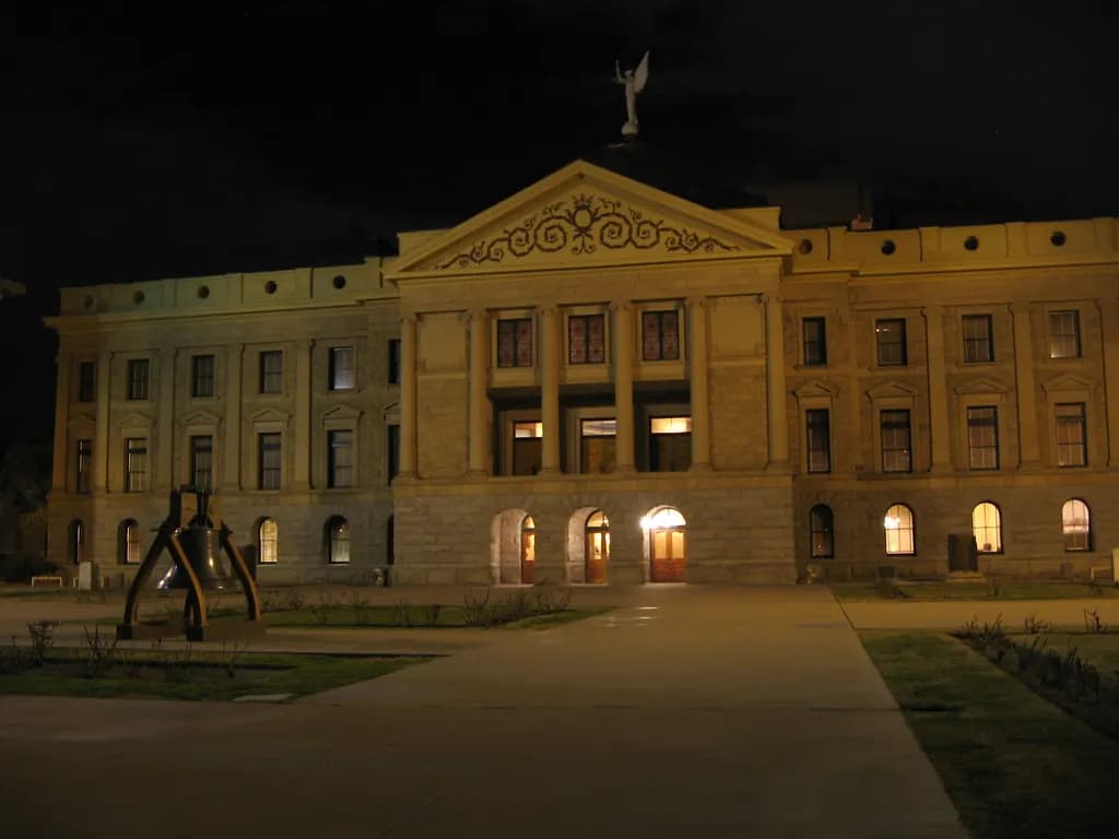 The historic Arizona State Capitol building in Phoenix lit at night
