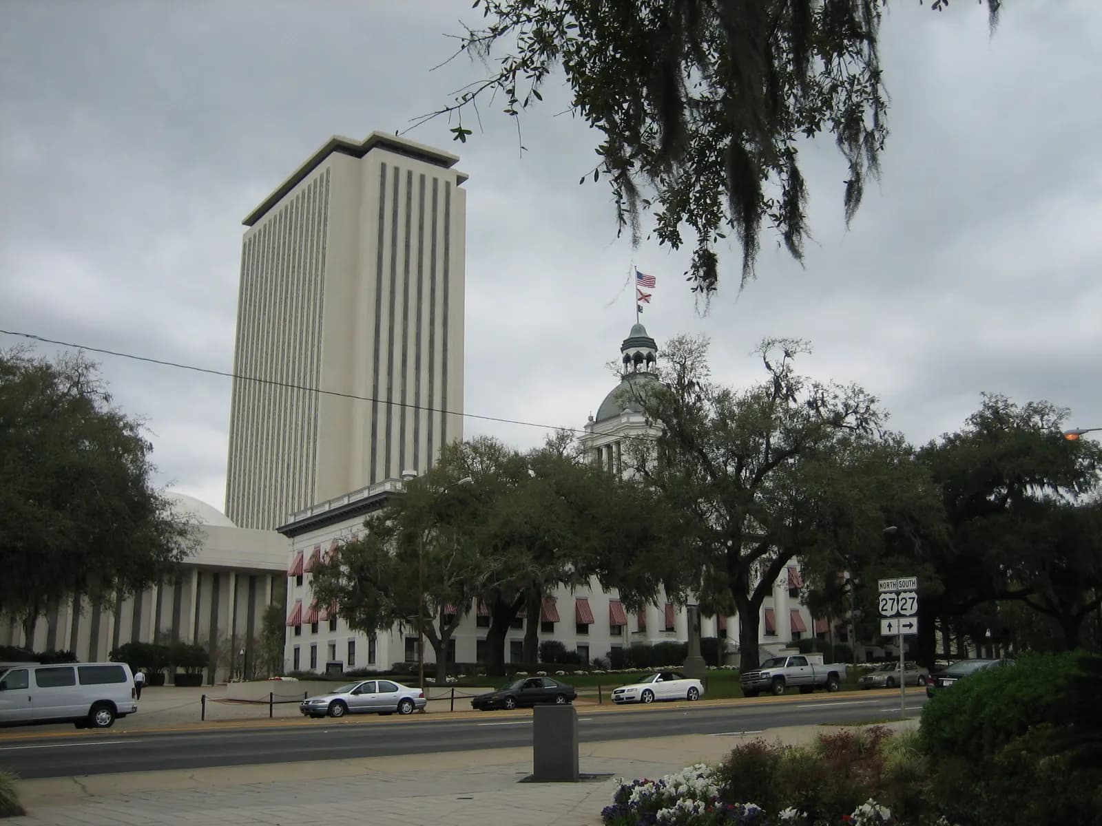The modern Florida Capitol tower rising behind the domed Old Capitol in Tallahassee