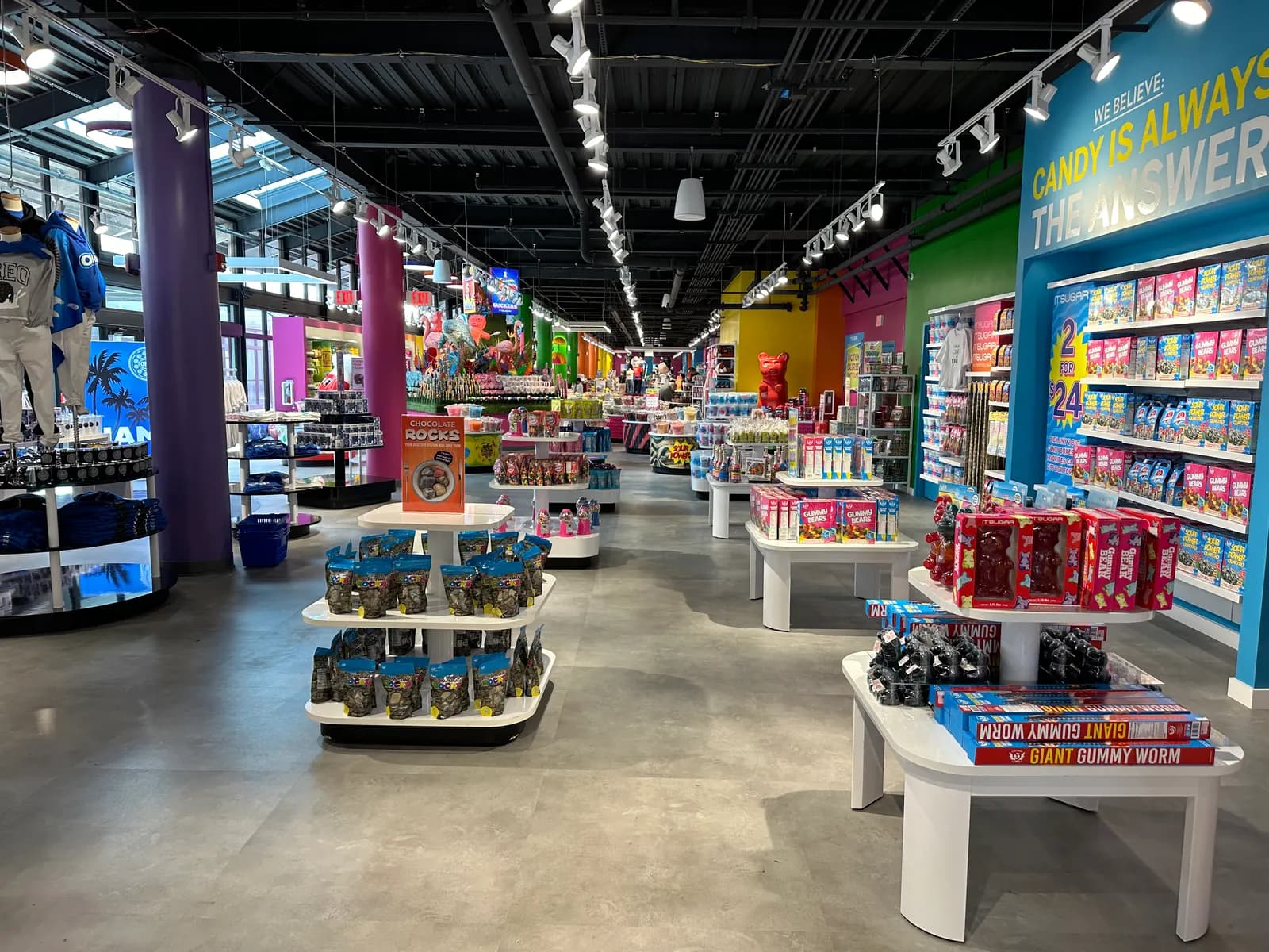 Interior of a candy and gift shop at Bayside Marketplace in downtown Miami, with shelves of packaged goods