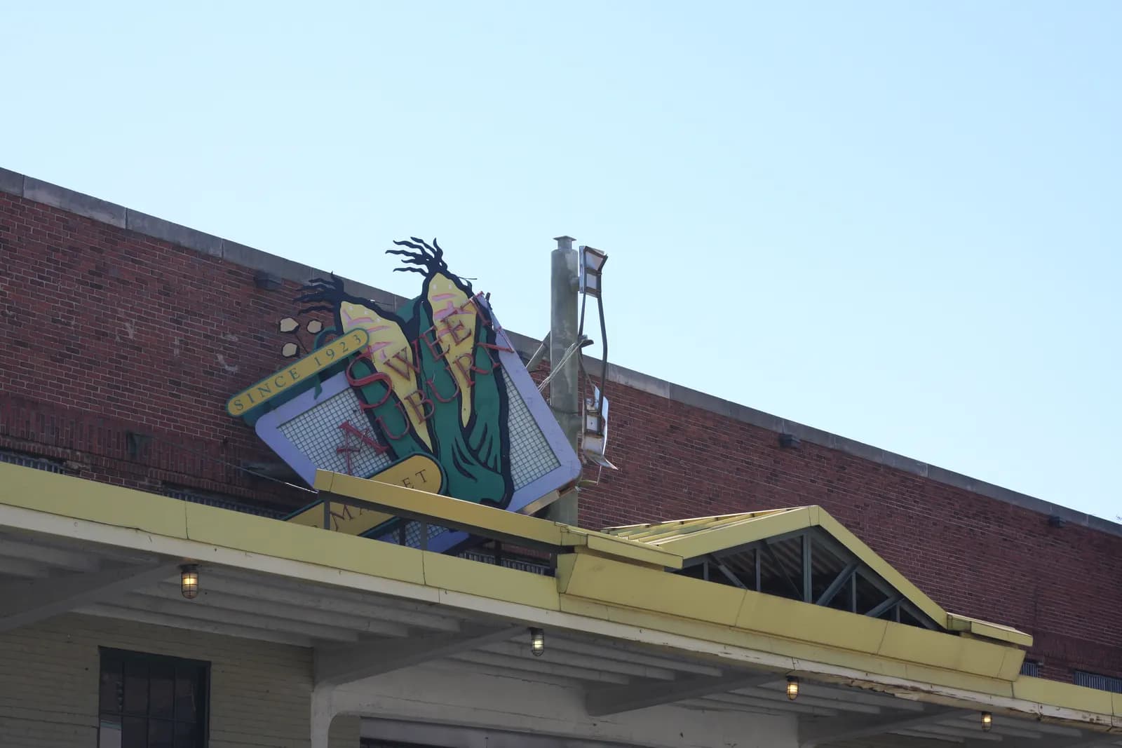 The corn-cob sign on the roof of the Sweet Auburn Curb Market, a public food market in Atlanta