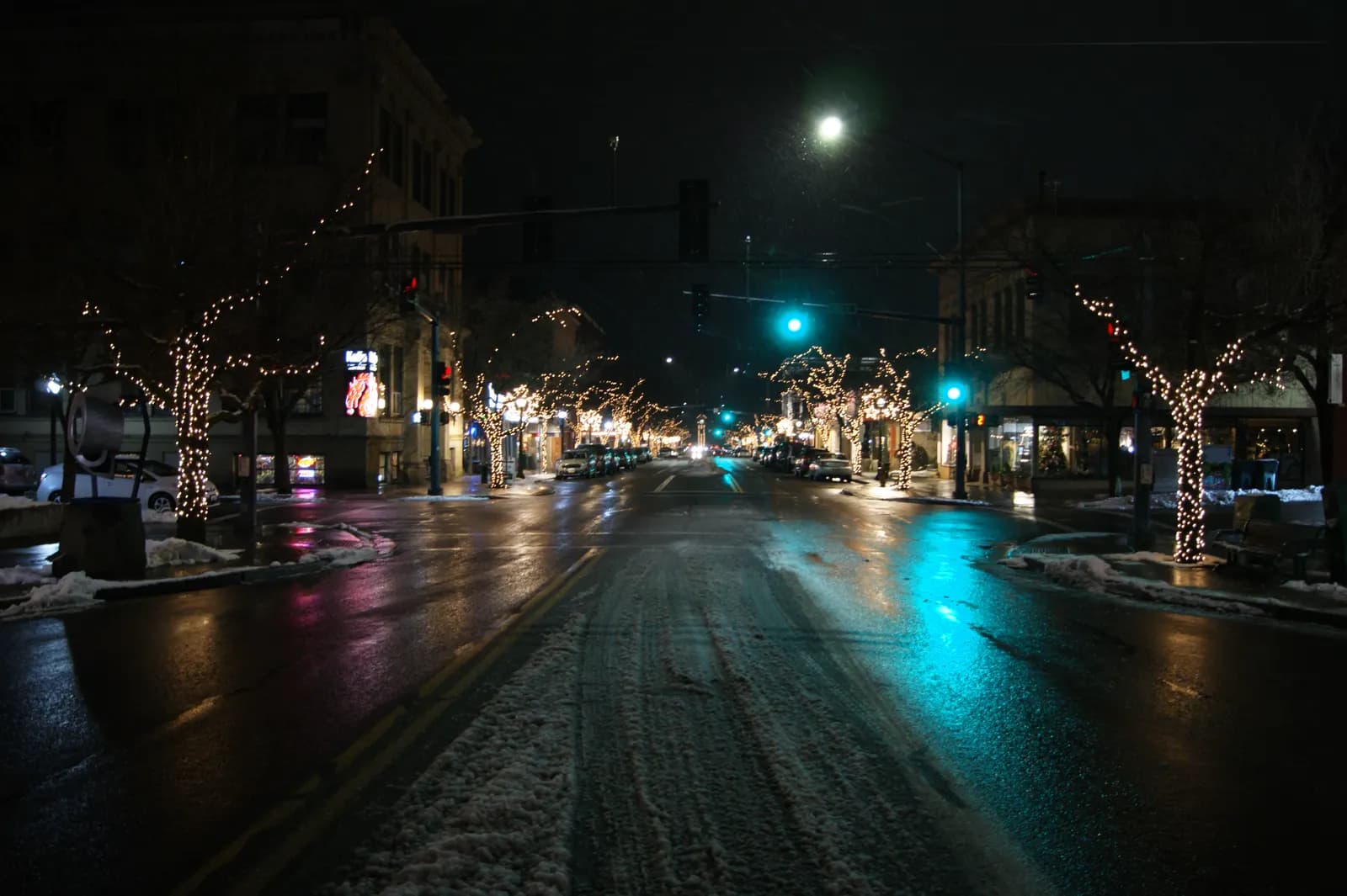 Shops along Sherman Avenue in downtown Coeur d'Alene, Idaho, with holiday lights