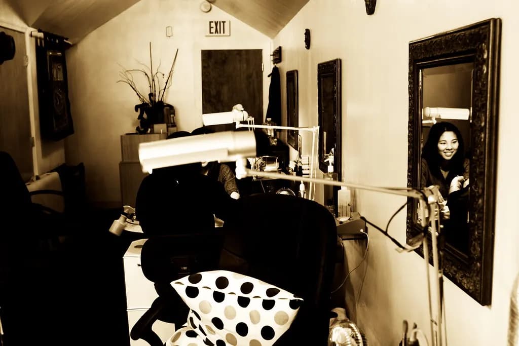 Interior of a small nail salon with manicure stations