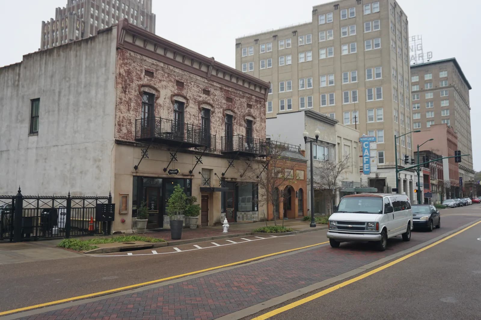 Historic brick storefront with iron balconies on West Capitol Street in downtown Jackson, Mississippi