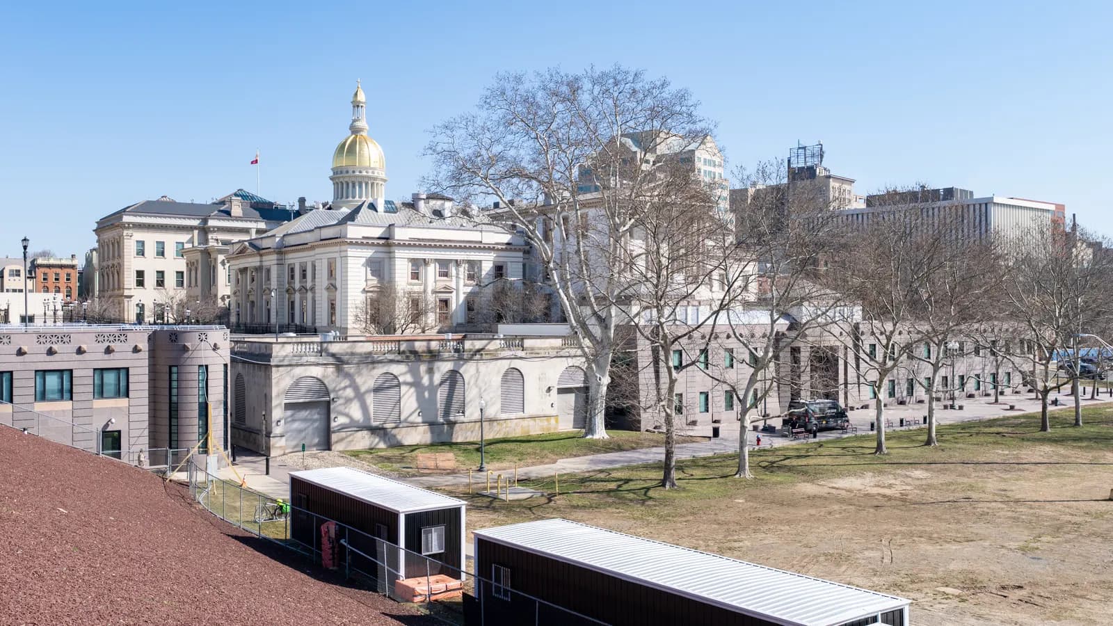 The New Jersey State House in Trenton with its gold dome above the columned front