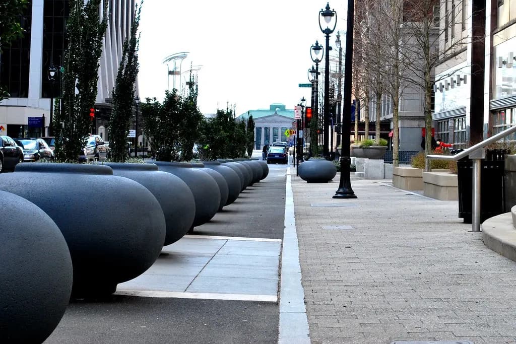 Fayetteville Street in downtown Raleigh lined with planters and street lamps