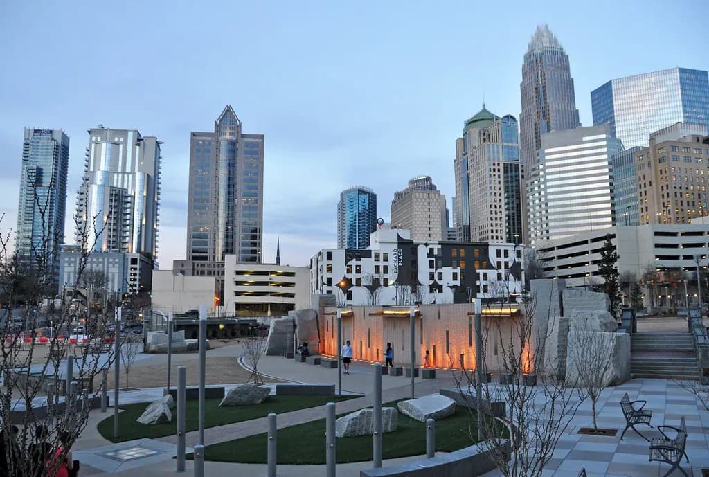 Uptown Charlotte skyscrapers seen from Romare Bearden Park at dusk