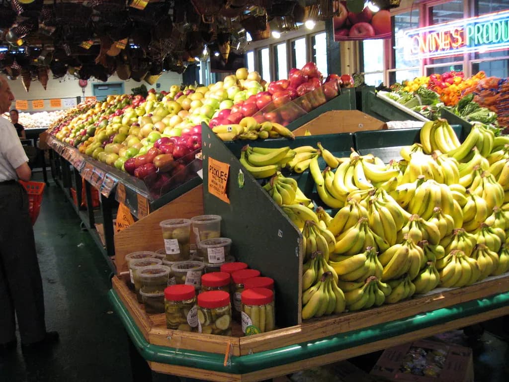 Fresh produce stacked on a vendor stall at Reading Terminal Market in Philadelphia