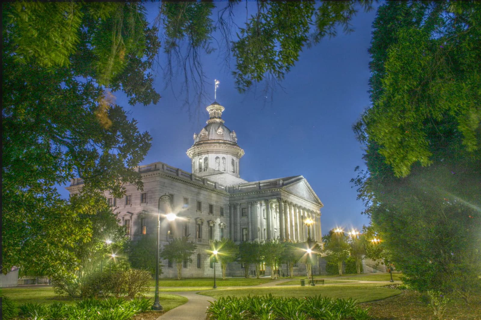 The domed South Carolina State House in Columbia seen across its landscaped grounds