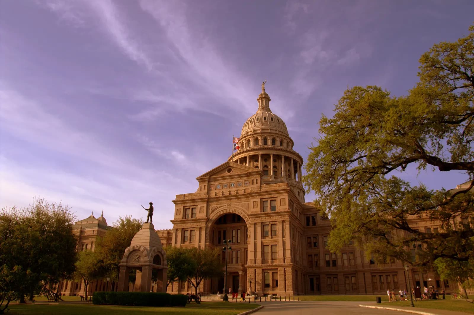 The Texas State Capitol building in Austin under a clear sky