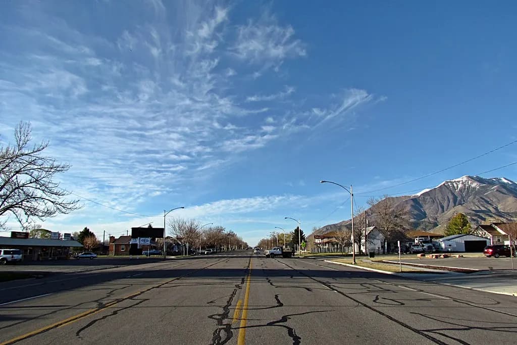 Main Street in Nephi, Utah, looking north with mountains behind