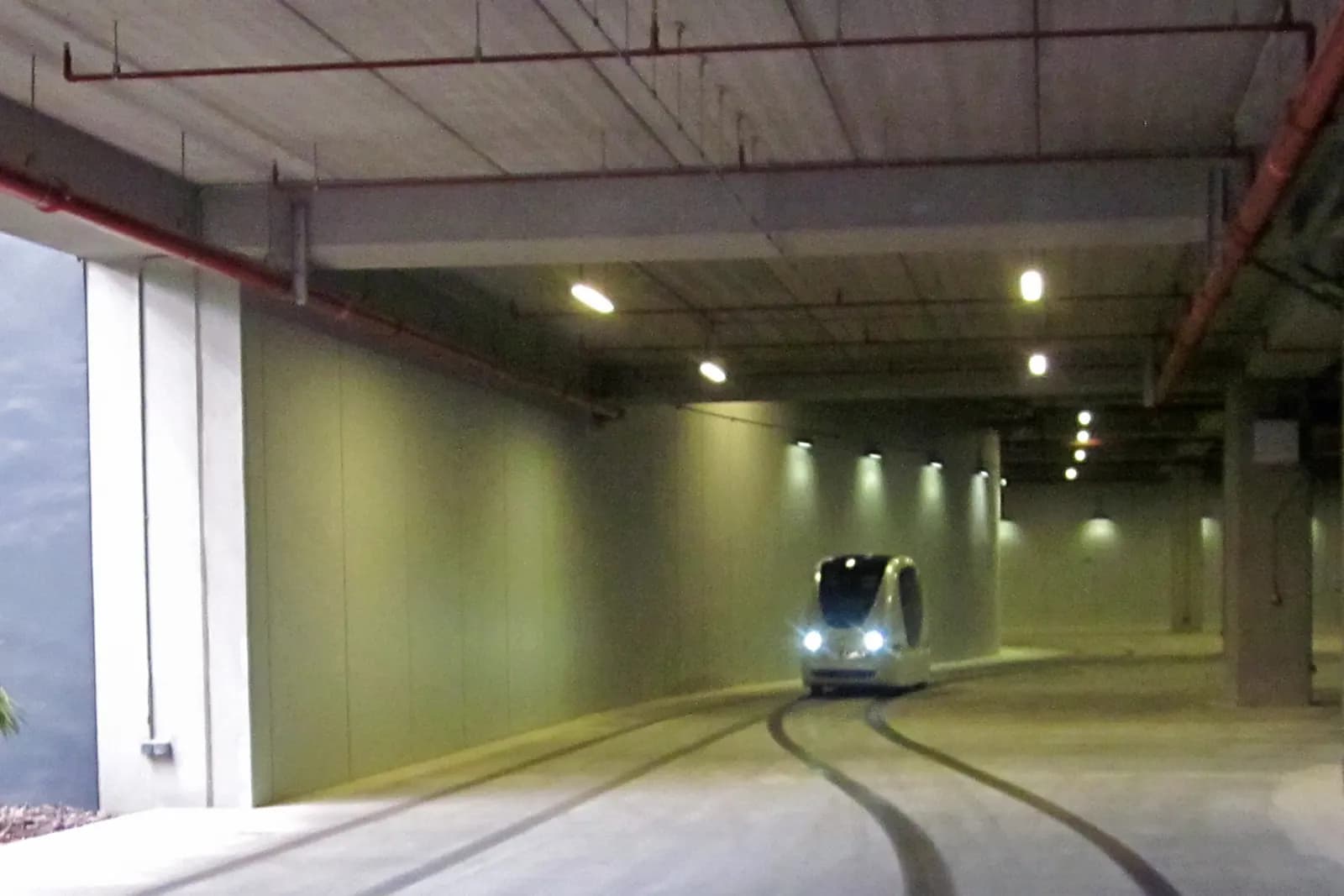 A driverless personal rapid transit pod in the undercroft beneath Masdar City
