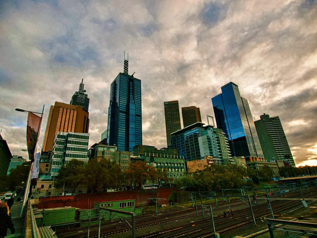 Office towers of Melbourne's central business district seen from beside the railway lines