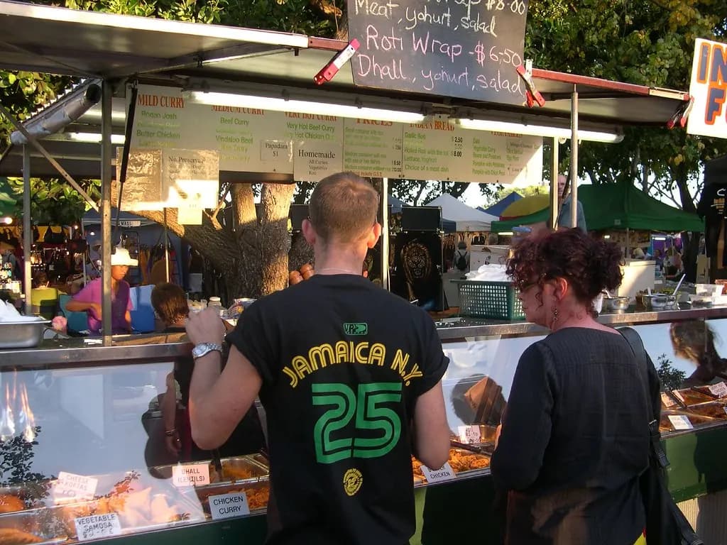 Indian food stall serving customers at Mindil Beach Sunset Market, Darwin