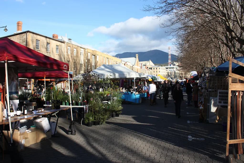 Market stalls with gazebos lining the street at Salamanca Market, Hobart
