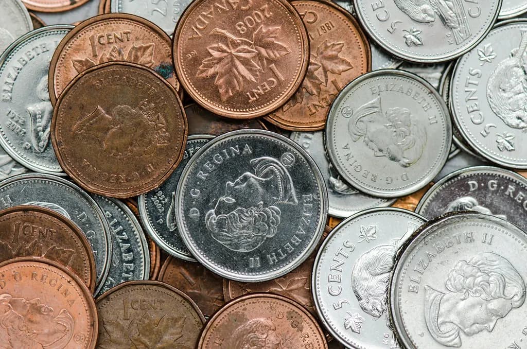 A close-up of Canadian pennies and nickels