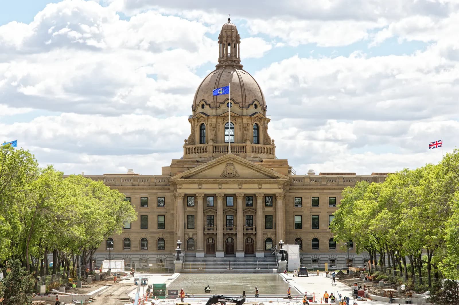 Alberta Legislature Building in Edmonton seen across its grounds on a summer day